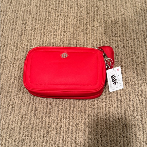 lululemon red camera bag Everywhere Belt Bag, 1L (Carnation Red) Two zippered compartments let you keep essentials organized and close at hand Lululemon Everywhere Belt Bag 1L